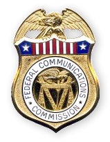 Office of Inspector General metal badge featuring an eagle, stars and stripes and the Federal Communications Commission seal.