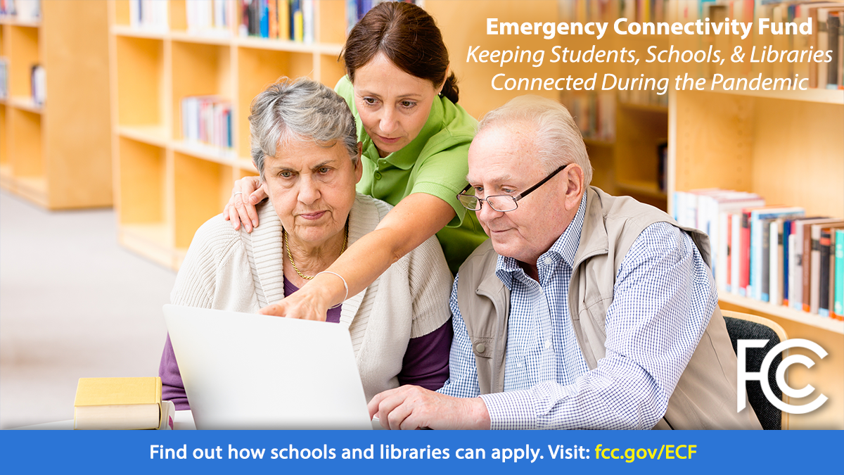 Emergency Connectivity Fund - woman helping senior couple with a laptop computer at a library table