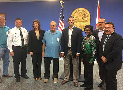 Chairman Pai and Commissioner Clyburn with first responders at the Miami Dade Emergency Operations Center.