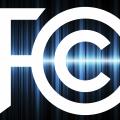 FCC Logo on background of blue wave forms
